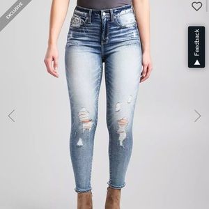 Buckle high rise skinny jeans